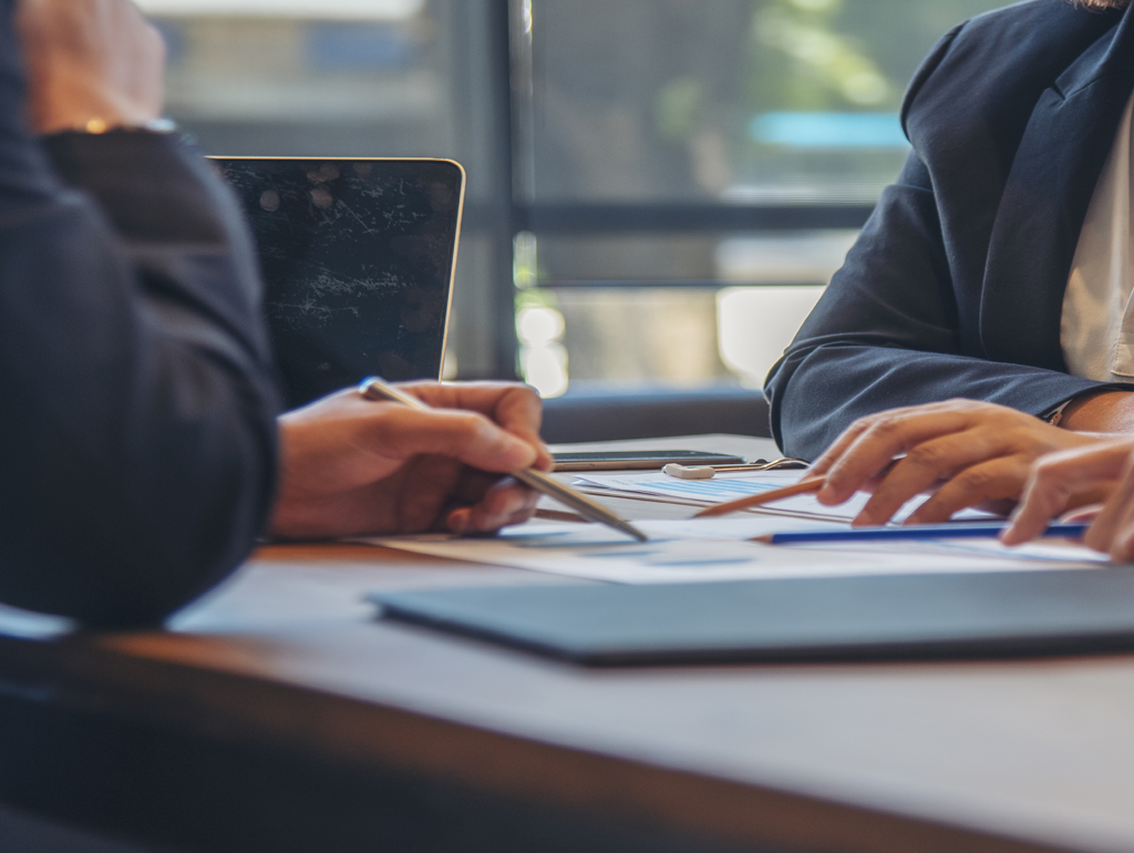 Two people working together at a table